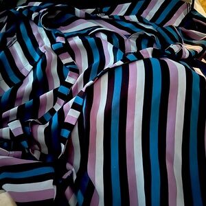 It’s a size 2x dress shirt from Torrid.